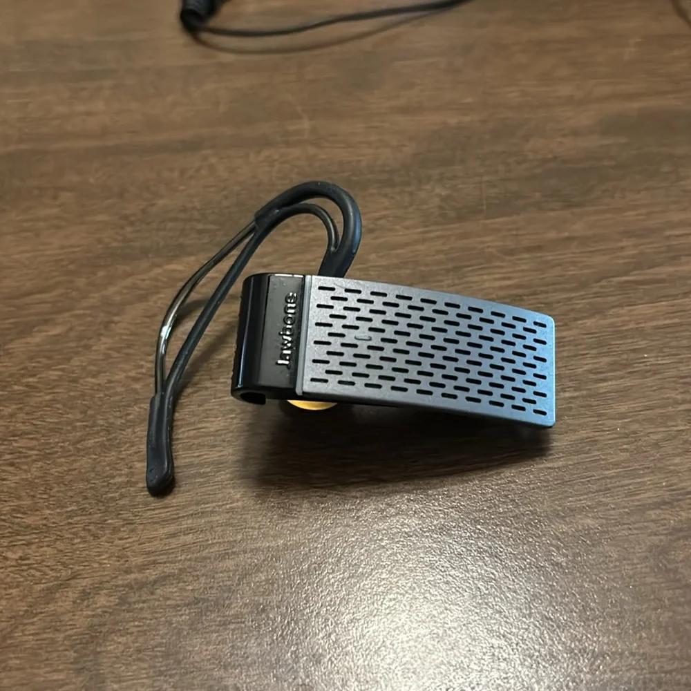 Jawbone Bluetooth earbud and charger